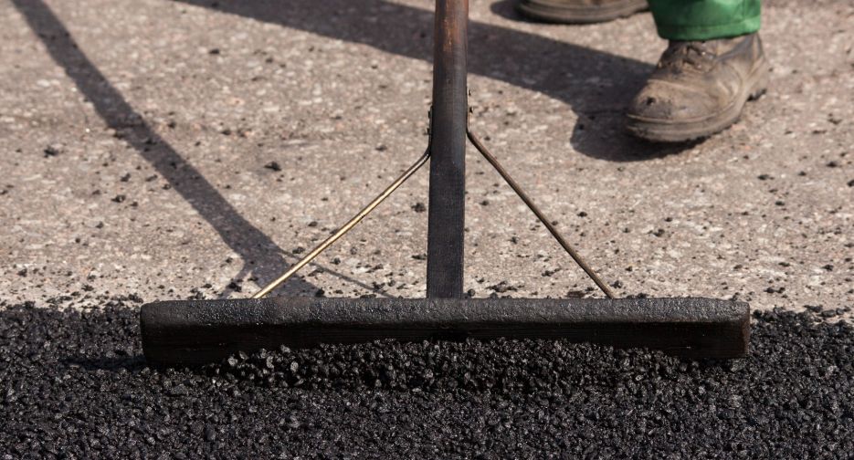 Repair of roads on the street, asphalt close-up